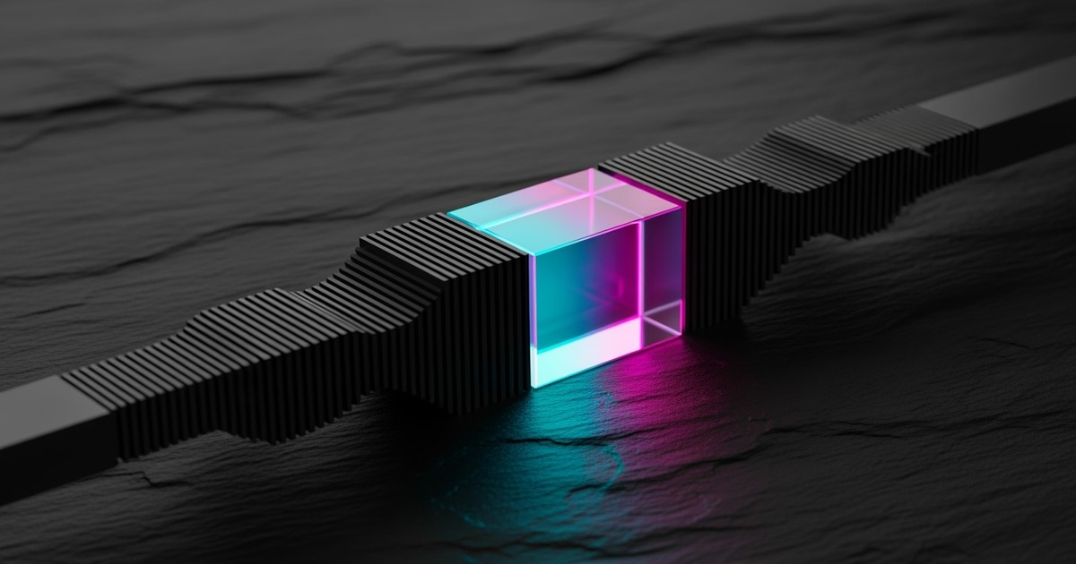 A matte black metal audio waveform sculpture with a glowing cyan and magenta glass segment inserted in the center, resting on dark slate.