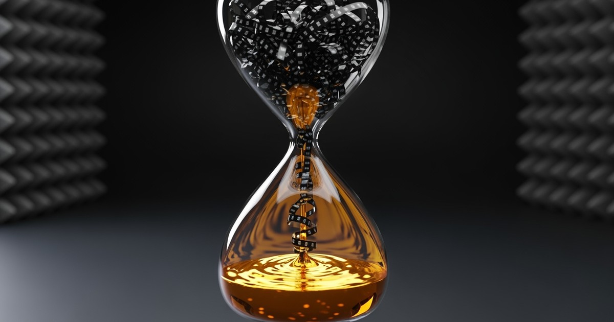 A modern hourglass suspended in a dark studio; black magnetic tape cascades from the top bulb, transforming into liquid gold in the bottom