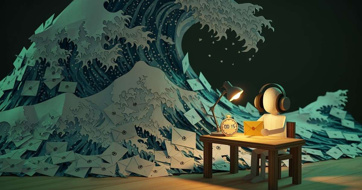 A paper-craft diorama showing a tidal wave of thousands of envelopes crashing over a small desk where a figure with headphones reviews a